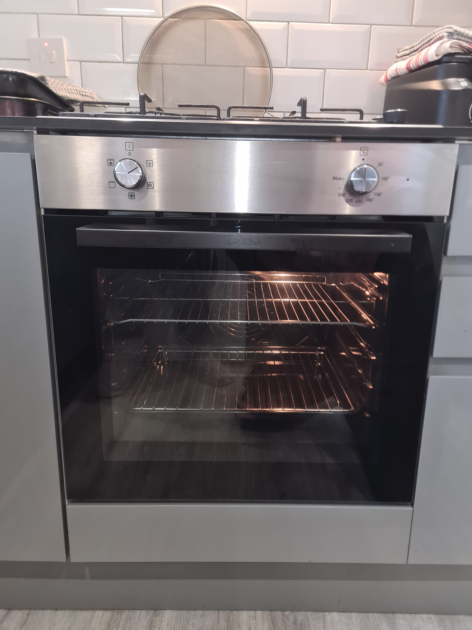 Clean stainless steel oven in a modern kitchen, professionally cleaned by MK Oven Clean